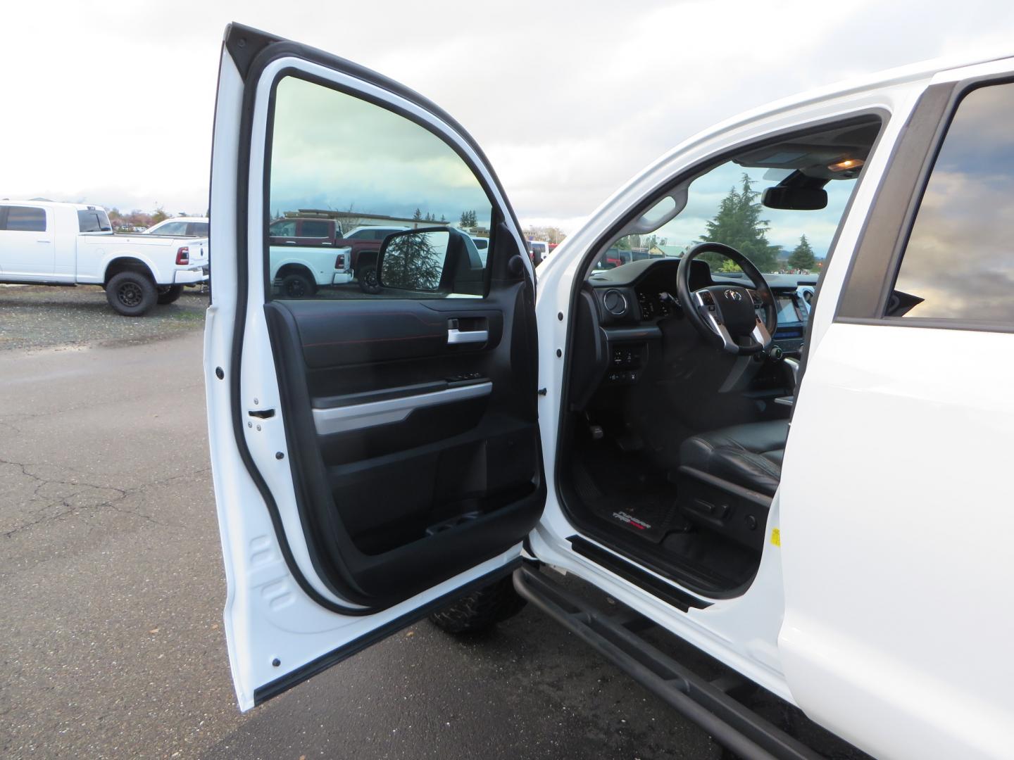 2020 White /BLACK Toyota Tundra SR5 5.7L V8 CrewMax 4WD (5TFDY5F12LX) with an 5.7L V8 DOHC 32V engine, 6A transmission, located at 2630 Grass Valley Highway, Auburn, CA, 95603, (530) 508-5100, 38.937893, -121.095482 - Clean tundra featuring a level kit, Icon Vehicle Dynamicxs upper control arms, 18" Method NV wheels, 35" BFG KO2 tires, Rocksliders, Retrax bedcover, Rigid Industries fog lights, RoadActive Suspension Custom Leaf Spring Enhancement Kit. - Photo#15